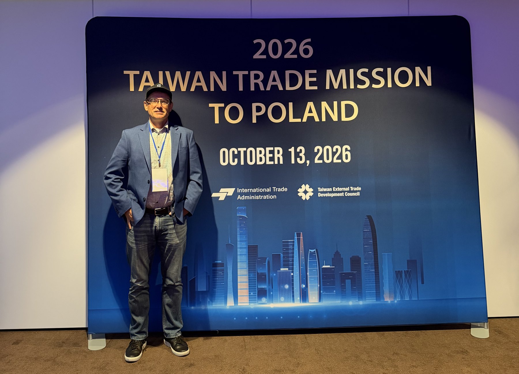 Tomasz Hasinski in front of the 2026 Taiwan Trade Mission to Poland backdrop at the NYX Hotel, Warsaw, 13 October 2026